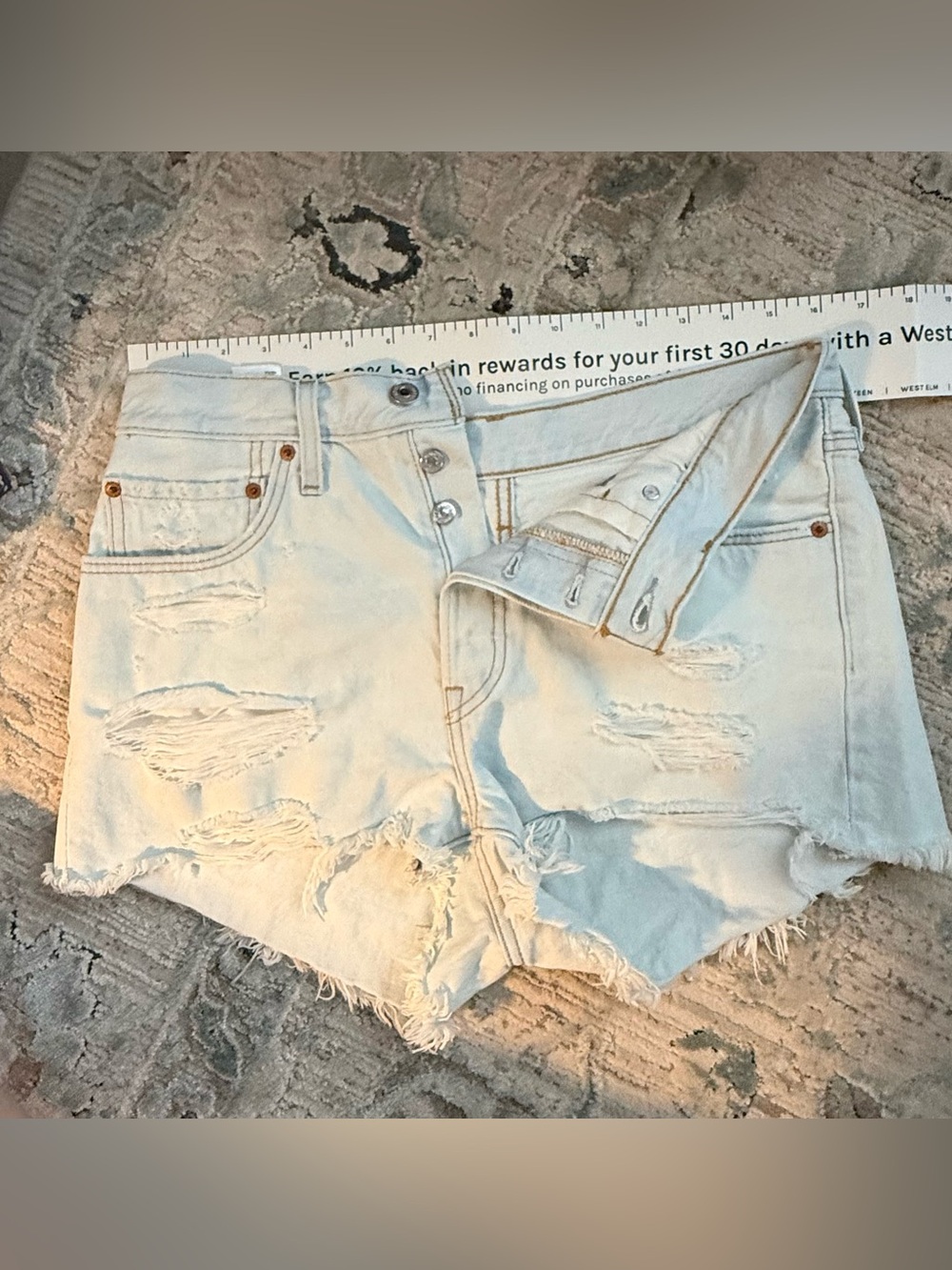 Levi's Distressed Light Blue High-Rise Denim Shorts